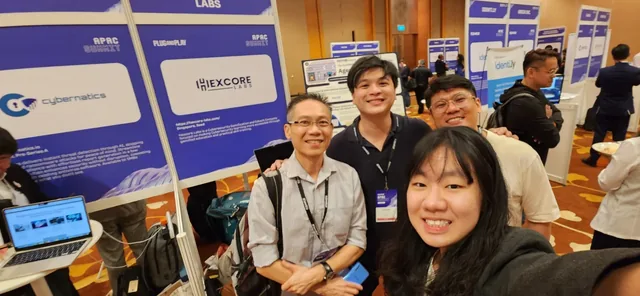 Kar Wei and team members at Hexcore Labs exhibition booth at Plug and Play APAC Summit 2024
